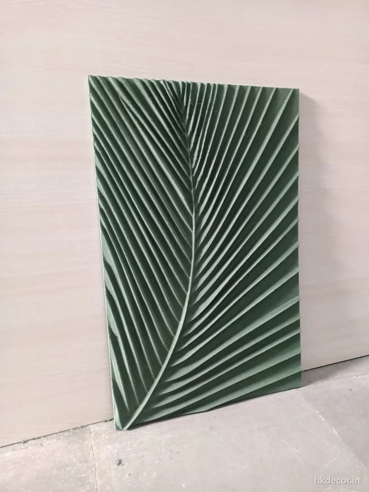 CNC cut wall panel with flutes angled off a central spine like a leaf vein, primed