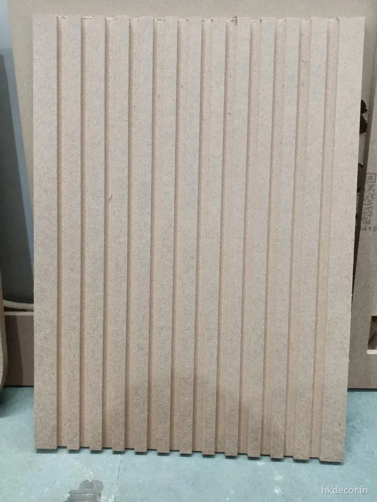CNC cut fluted MDF panel in raw board showing the groove profile before finishing