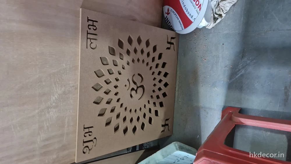 CNC cut perforated back panel in raw board with a radial motif