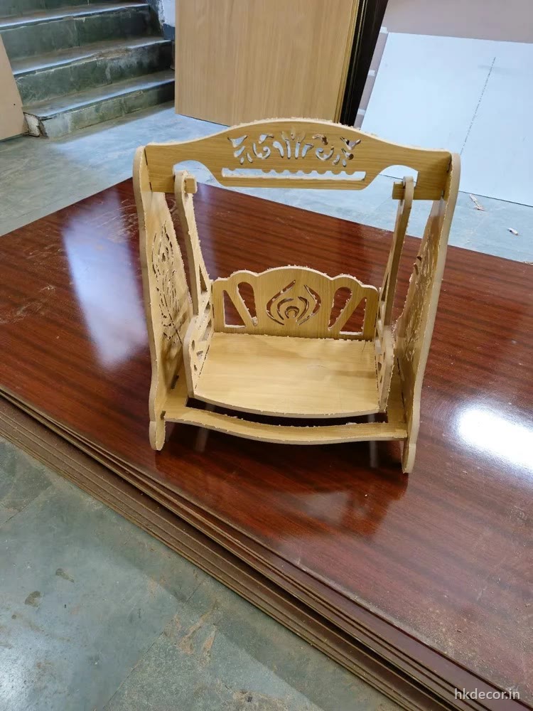 Laser cut flat-pack jhula swing for a home mandir, natural board finish