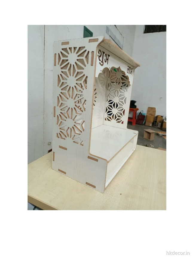 Laser cut flat-pack kit in thin board slotted together without tools or fixings