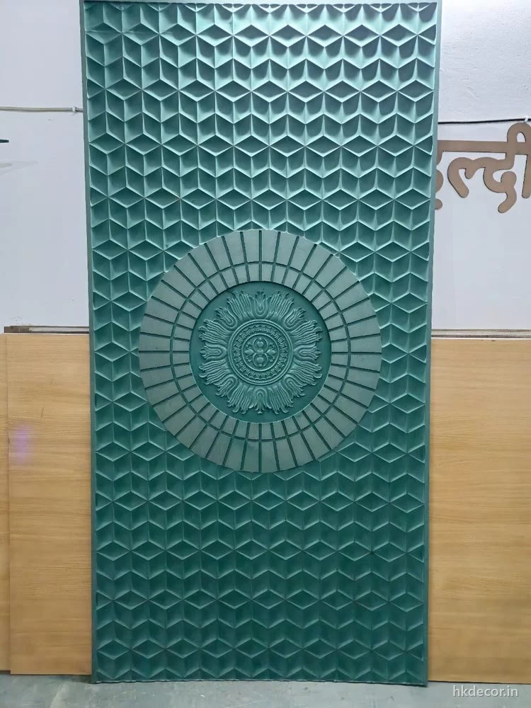 CNC cut wall panel with a radial mandala medallion set into a faceted geometric field, primed
