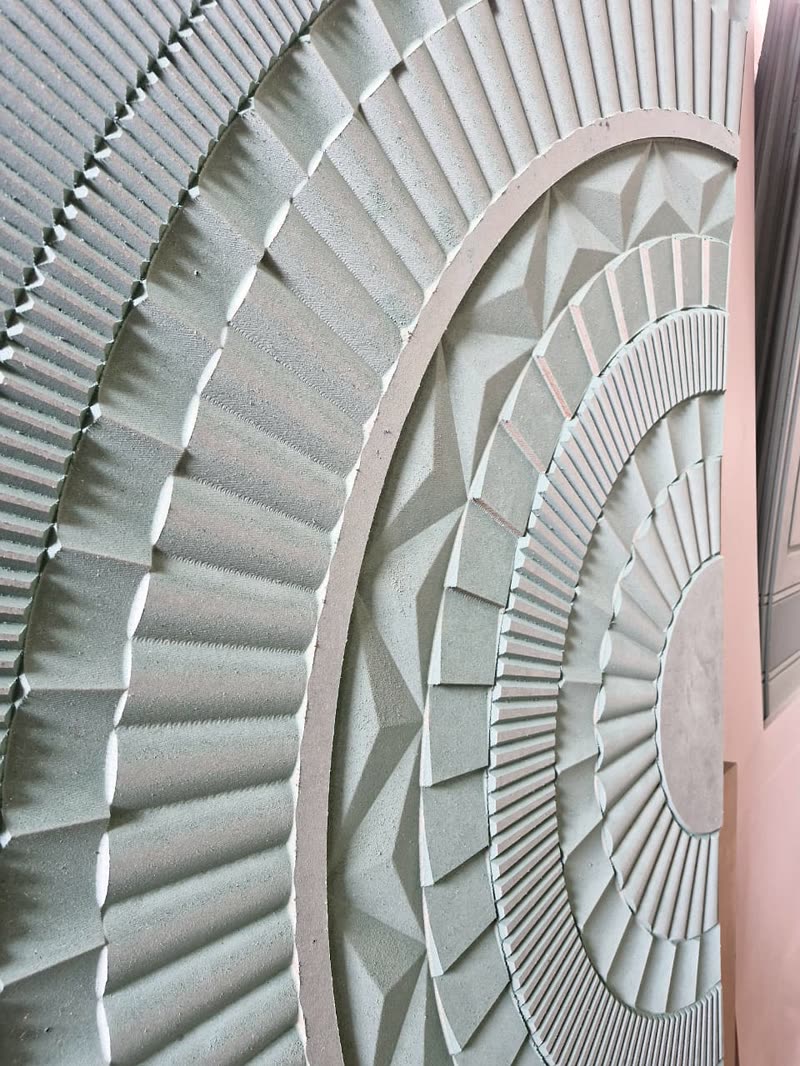Close up of the carved rings in a CNC cut mandala wall panel