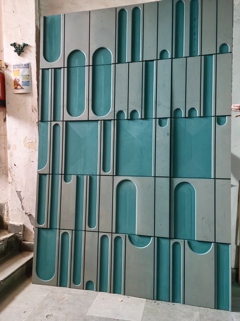 Modular 3D wall panel grid with rounded slot cut-outs, CNC cut and primed