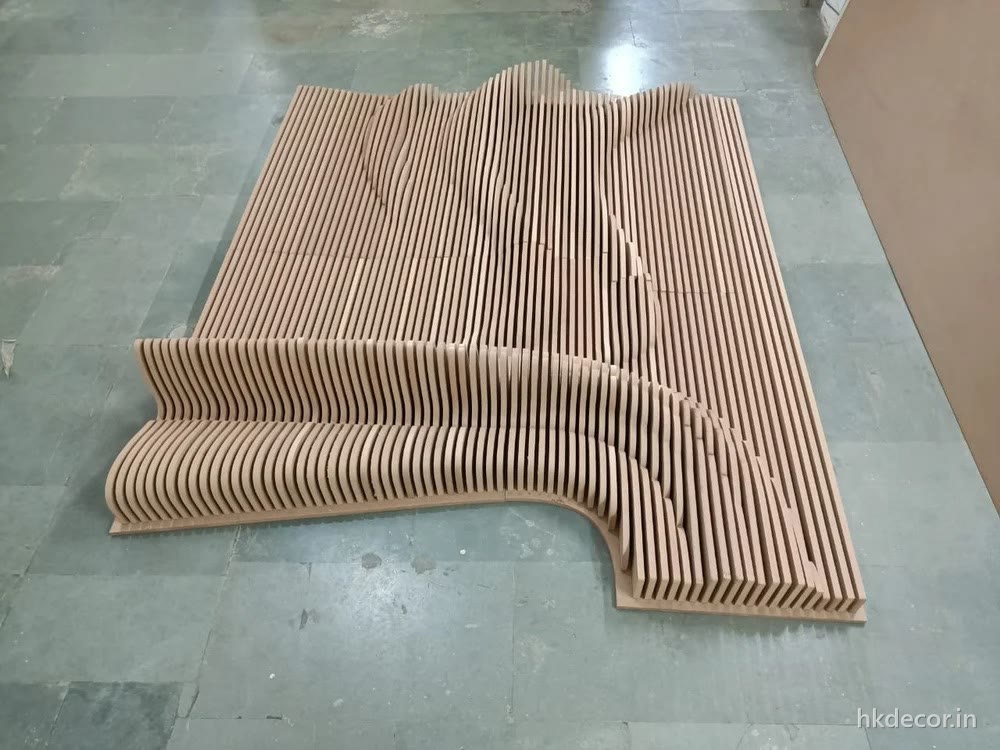 End view of a CNC cut parametric rib form showing the pitch and depth of each stacked rib